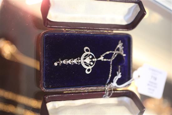 A Belle Epoque gold and platinum, diamond and seed pearl pendant, pendant 2.25in.